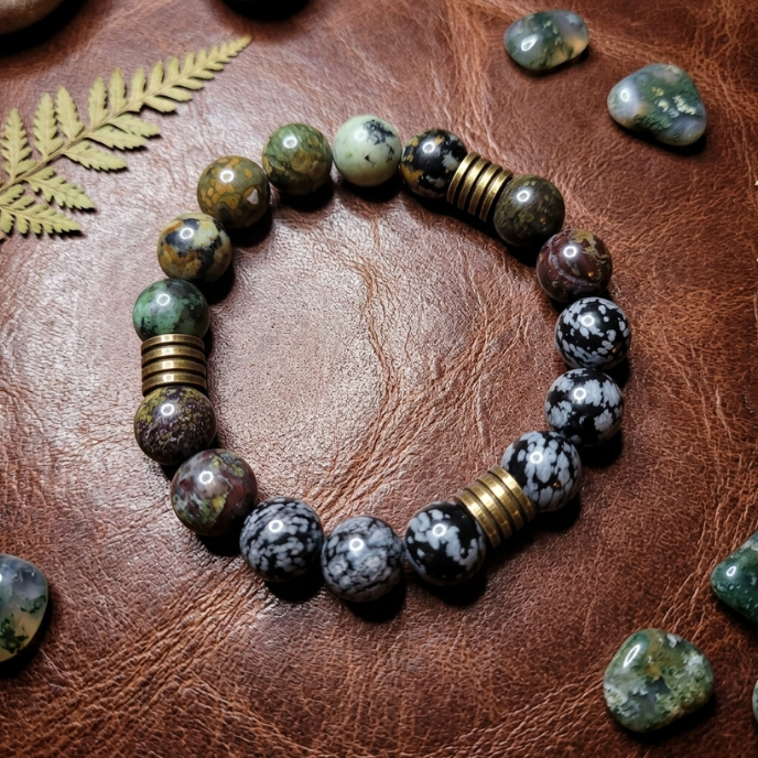Beaded bracelet with natural stones on a brown leather surface